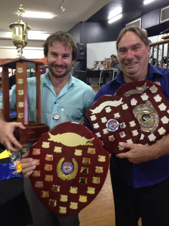 Norths lock Chris Scanlan needs his father Norm's help to carry his awards.